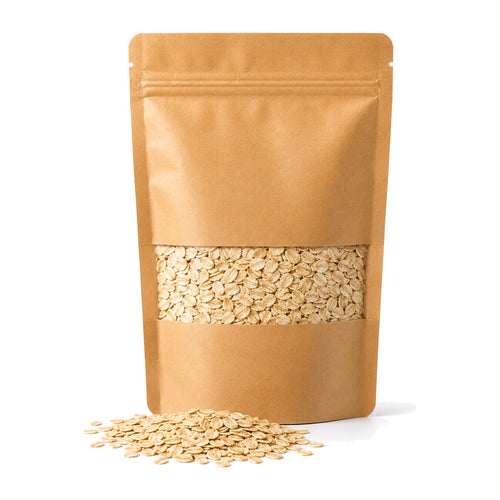 Kraft pouch of Australian rolled oats with a window showing pale golden oat flakes and a scattering of loose oats in front